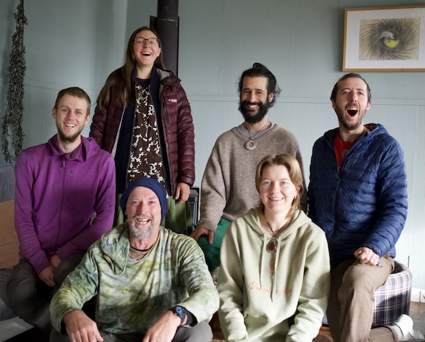 Group of people smiling together at Ahi o te Manawa